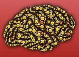 a brain made up of smiley faces on a red background