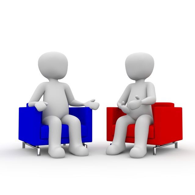 two 3d people sitting on different colored couches