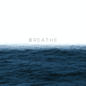 a large body of water with the word breathe in the middle of it